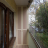 Встроенный двустворчатый распашной шкаф для балкона