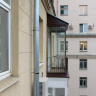 Балкон с безрамным остеклением от пола до потолка